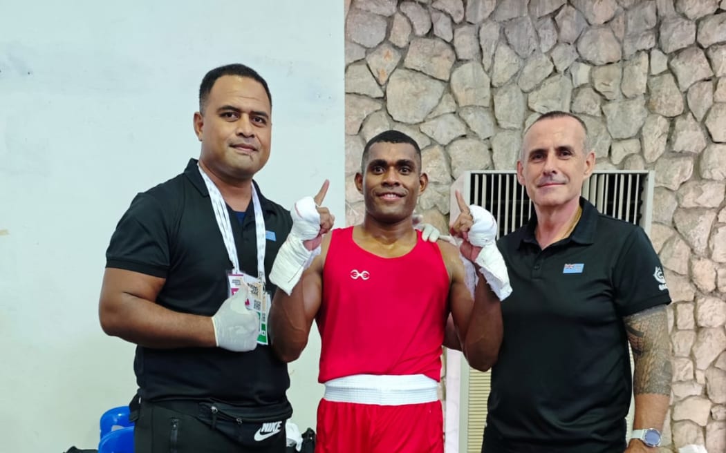 Fiji's Aminiasi Saratibau (middle) with team Fiji officials after causing a major upset at the 2024 Boxing 2nd World Qualification Tournament in Bangkok.