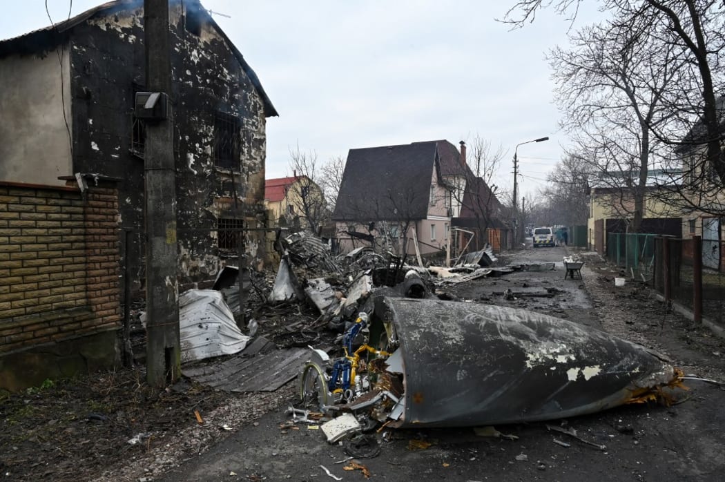 A view shows the wreckage of an unidentified aircraft which crashed into a  private house in a residential area in Kyiv on February 25, 2022.