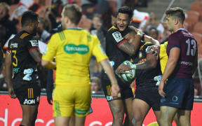 Etene Nanai-Seturo celebrates scoring a try in the Chiefs vs Reds Super Rugby match at Waikato Stadium.