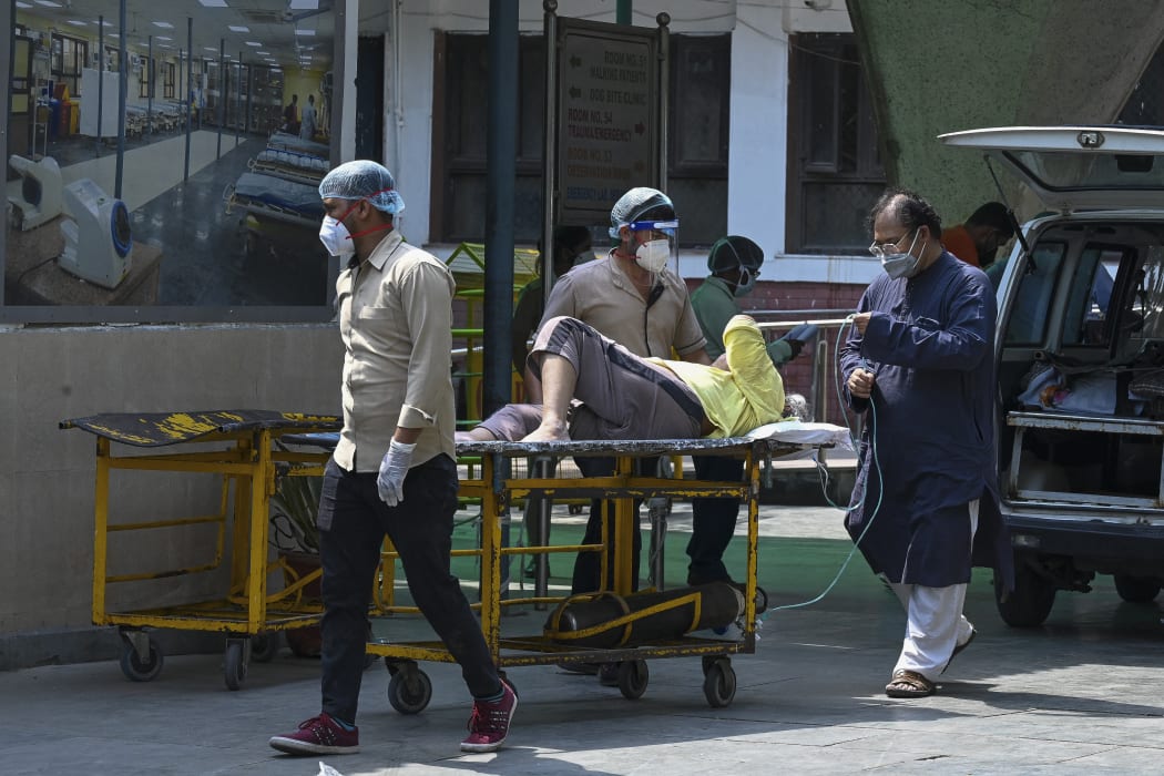 A Covid-19 patient arrives at the GTB hospital in New Delhi on 29 April 2021.