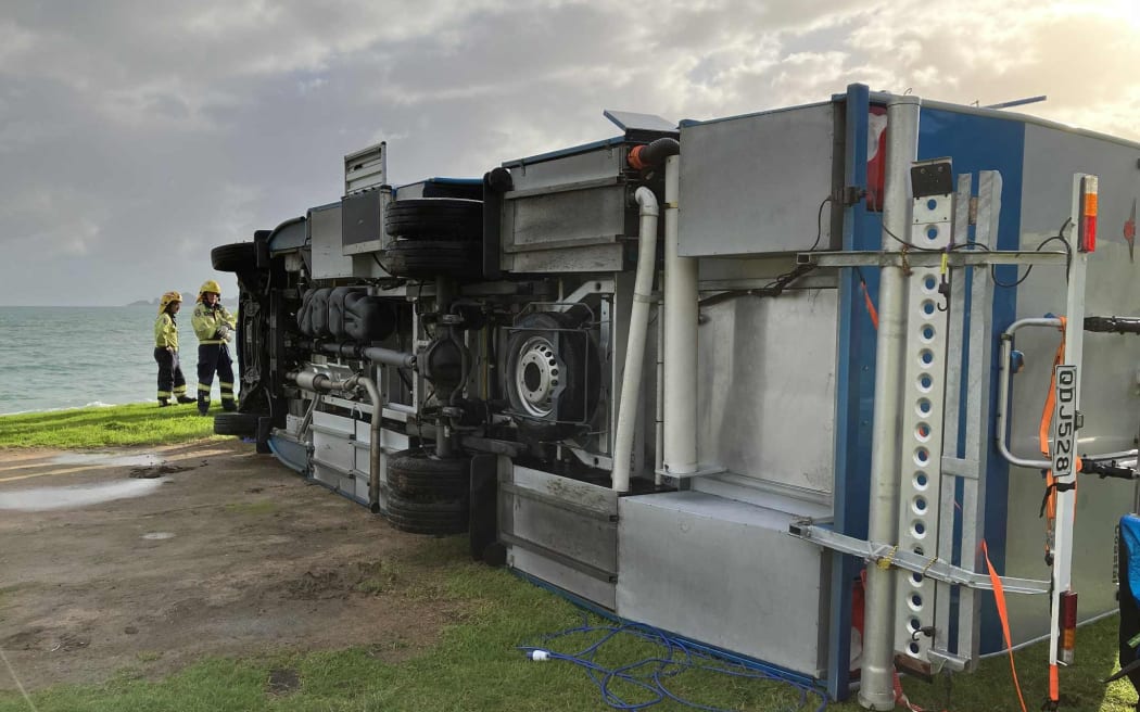 The suspected tornado flipped this campervan on its side, injuring the 79-year-old occupant.