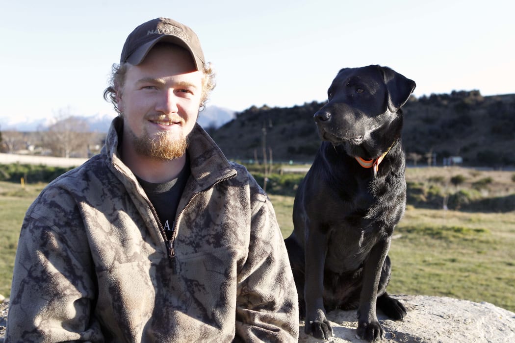 030916 Photo: Richard Cosgrove/Fish & Game New Zealand
NZ Live Duck Calling champion Hunter Morrow and his steadfast companion Teal at home in Luggage, Central Otago.