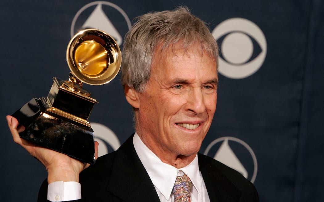 In this file photo taken on 8 February, 2006, US composer Burt Bacharach poses with his award for Best Pop Instrumental Album in the press room at the 48th Annual Grammy Awards in Los Angeles, California.
