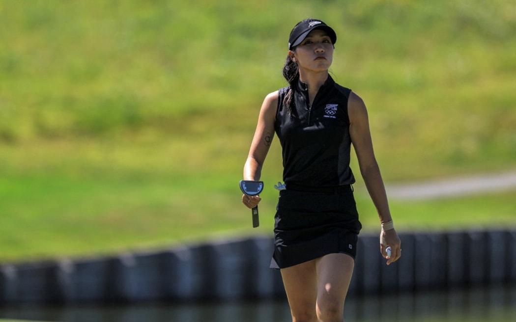 New Zealand's Lydia Ko reacts during round 4 of the women’s golf individual stroke play of the Paris 2024 Olympic Games at Le Golf National in Guyancourt, south-west of Paris, on August 10, 2024. (Photo by Emmanuel DUNAND / AFP)