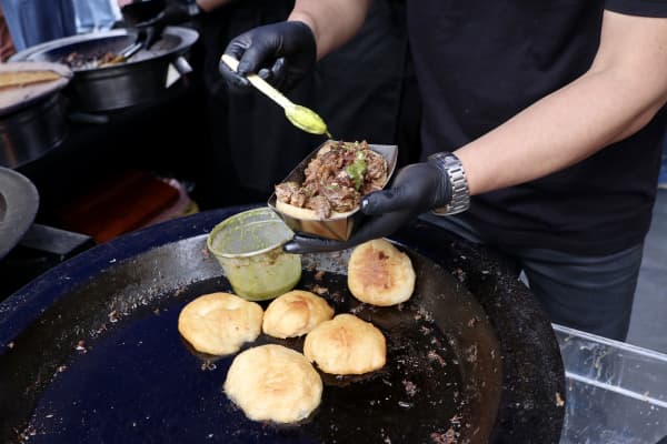 Anthony Hoy Fong's hangi-style slowed cooked lamb at the re-opening of the Metropolitan Museum Oceania Galleries in New York.