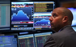 A trader on the floor of the New York Stock Exchange on Monday.