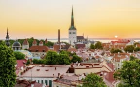 View over the Old Town towards St. Olaf's Church at sunrise, UNESCO World Heritage Site, Tallinn, Estonia, Europe (Photo by Karol Kozlowski / Robert Harding RF / robertharding via AFP)