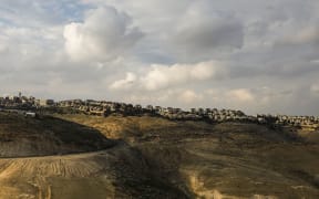 This picture taken on January 28, 2020 from the Israeli settlement of Kedar shows a view of the settlement of Maale Adumim, Israel's largest in the occupied West Bank. (Photo by MENAHEM KAHANA / AFP)
