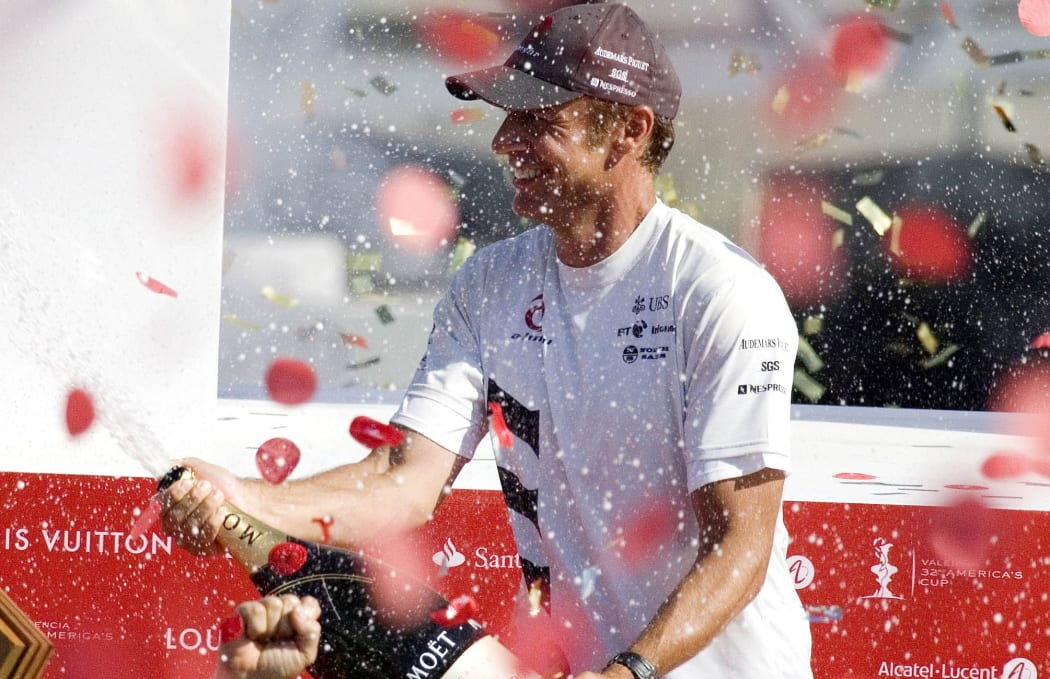 Ernesto Bertarelli celebrates winning the America's Cup in 2003.