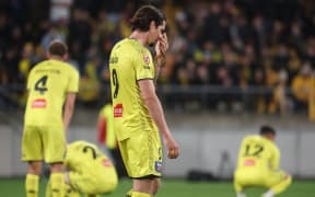 Phoenix Oskar Zawada (C stands dejected after their loss during the A-League Men’s Semi Final 1 (2nd leg) - Wellington Phoenix v Melbourne  Victory FC at Sky Stadium, Wellington on the 18th May 2024. © Copyright image by Marty Melville / www.photosport.nz