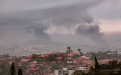 A view of the Motor Pool district of Noumea on May 15, 2024, amid protests linked to a debate on a constitutional bill aimed at enlarging the electorate for upcoming elections of the overseas French territory of New Caledonia. One person was killed, hundreds more were injured, shops were looted and public buildings torched during a second night of rioting in New Caledonia, authorities said Wednesday, as anger over constitutional reforms from Paris boiled over. (Photo by Delphine Mayeur / AFP)