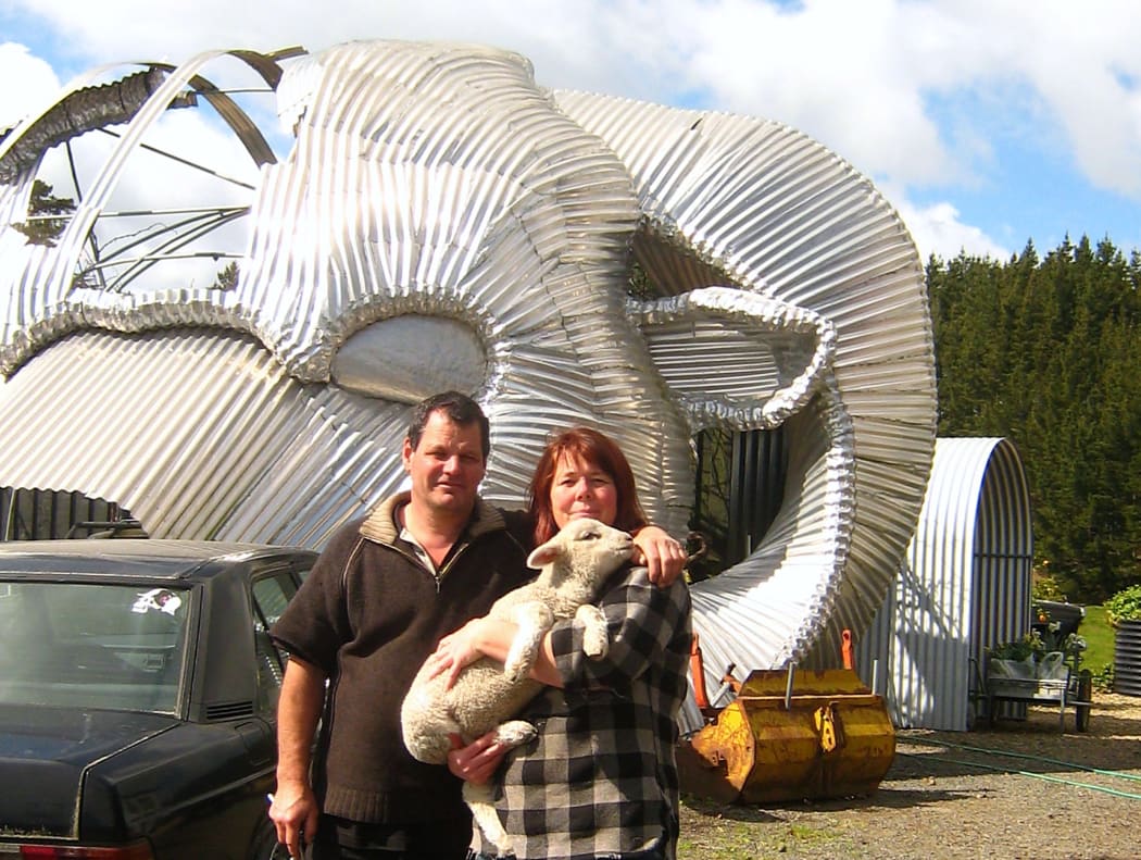 Steven and Sheryn Clothier, with Spence their house lamb.