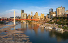 (FILE) The water level of the Yangtze River and Jialing River in the Chongqing section falls in Chongqing, China, August 17, 2022. (Photo by Costfoto/NurPhoto) (Photo by CFOTO / NurPhoto via AFP)