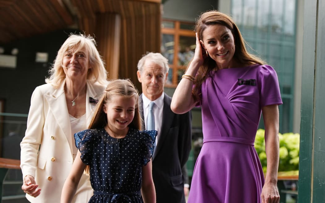 Catherine, Princess of Wales (R) and Princess Charlotte (2nd L) arrive at Wimbledon. The Princess of Wales will present the trophy to the winner of the men's final.
