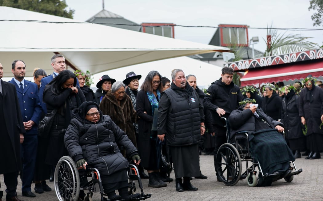 Visitors, including Police Commissioner Andrew Coster, being welcomed onto Tuurangawaewae Marae.