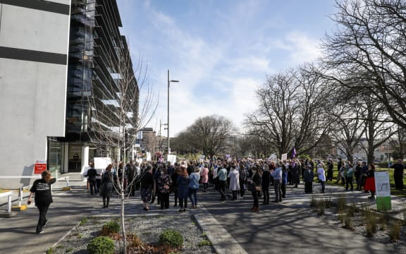Protesters gather outside of the Canterbury Health Board corporate office on 20 August.