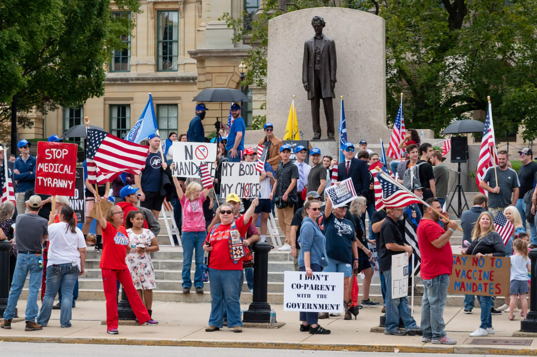 A protest against vaccine mandates and Covid-19 'tyranny' outside the Illinois State Capitol on 2 October.
