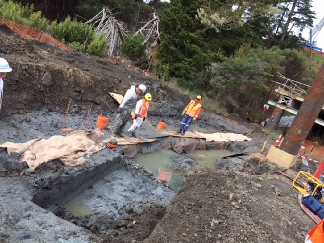 The object that’s believed to be a partially complete waka is under wraps at the Ōkahu inlet on the Pūhoi to Warkworth motorway project.