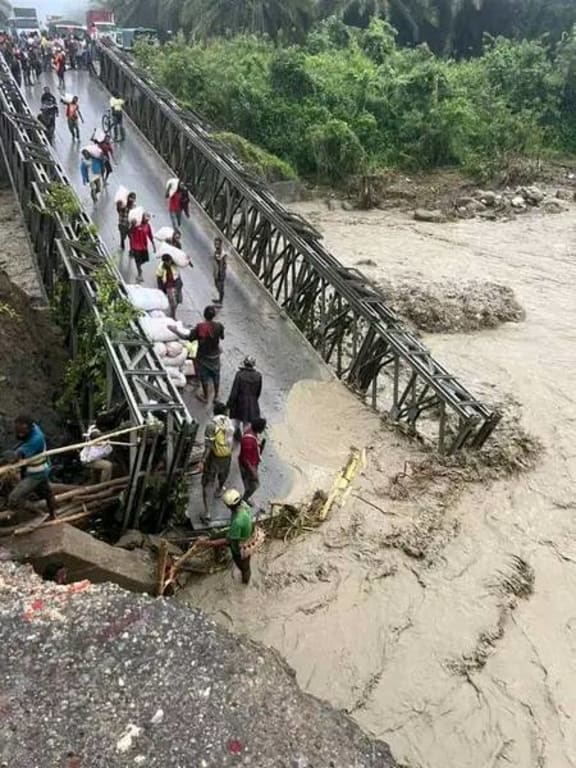 Uria River Bridge, Ramu Valley, Usino Bundi District, Madang Province swept away by angry tide