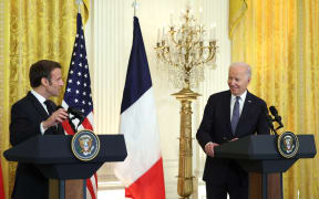 US President Joe Biden and French President Emmanuel Macron hold a joint press conference at the White House during an official state visit on December 01, 2022 in Washington, DC.