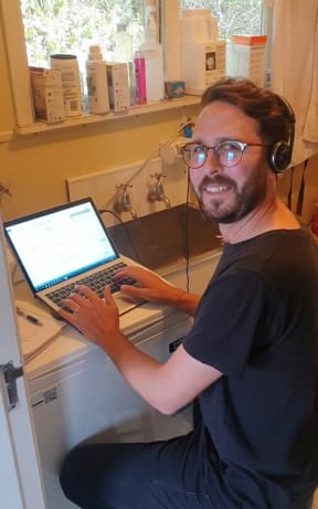 Hamish Cardwell working from his laundry during the Covid-19 lockdown.