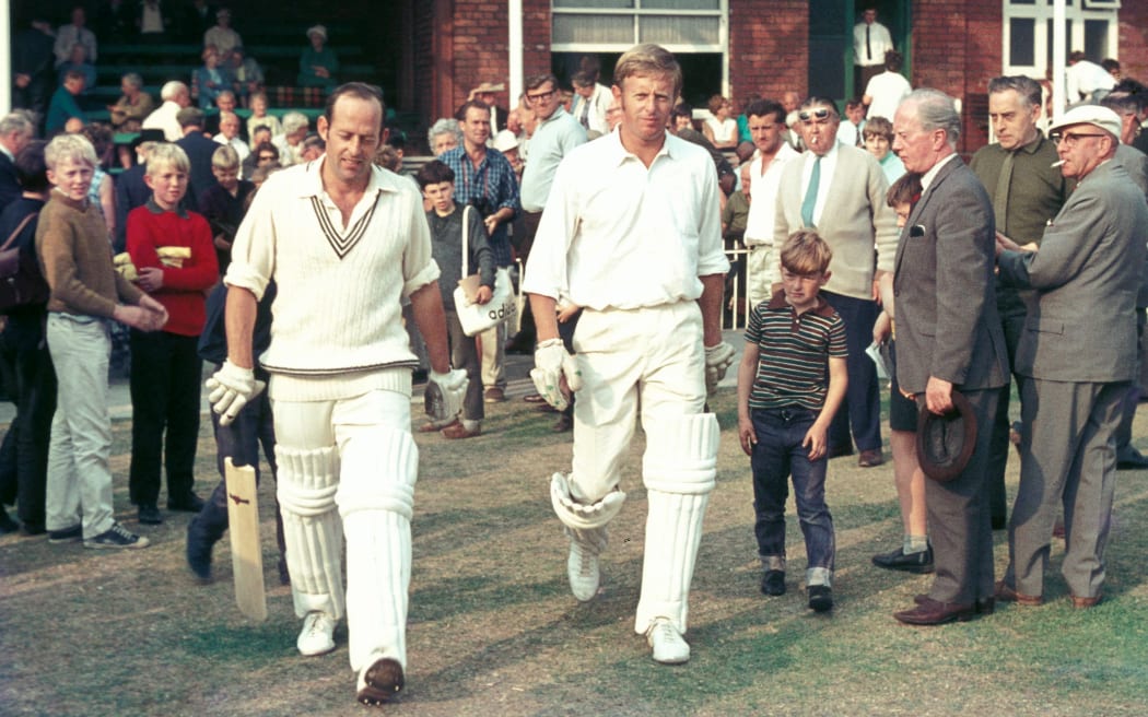 New Zealand openers Brian Hastings (left) and Mark Burgess make their way to the pitch.