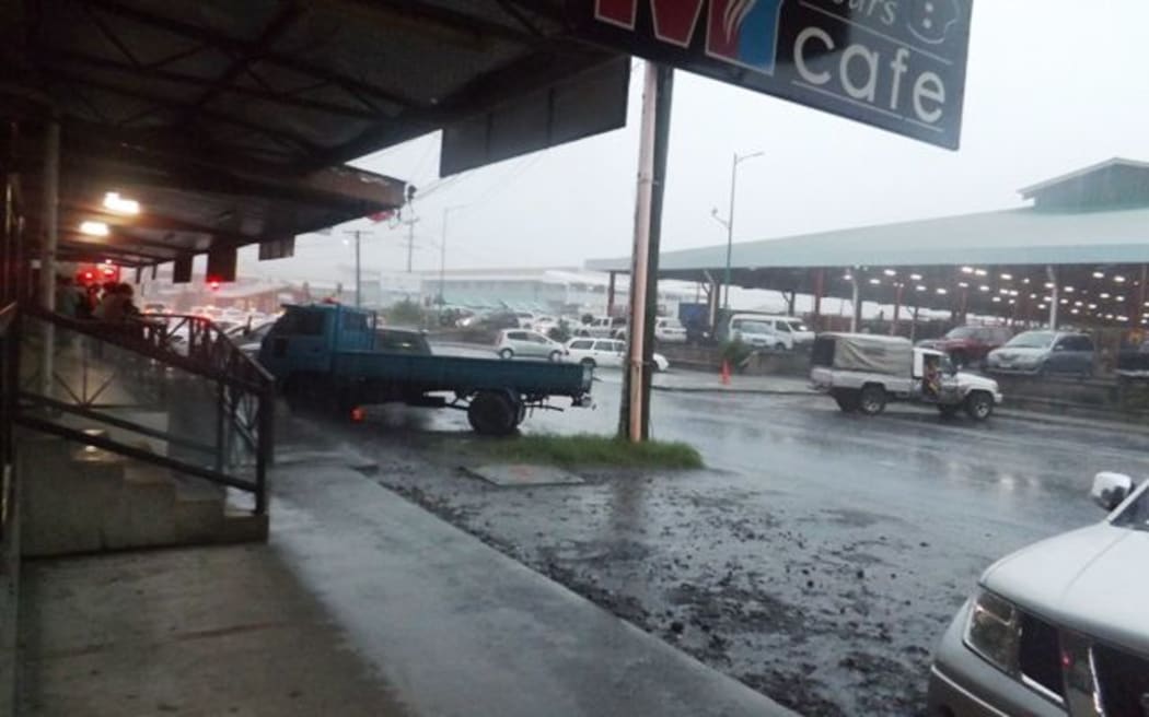 Heavy rain in Samoa's capital this morning as the nation awaits tropical cyclone Amos.