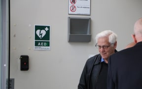 Michael Beaumont (right) with his lawyer. The former Catholic Brother is before the court accused of abusing young girls.