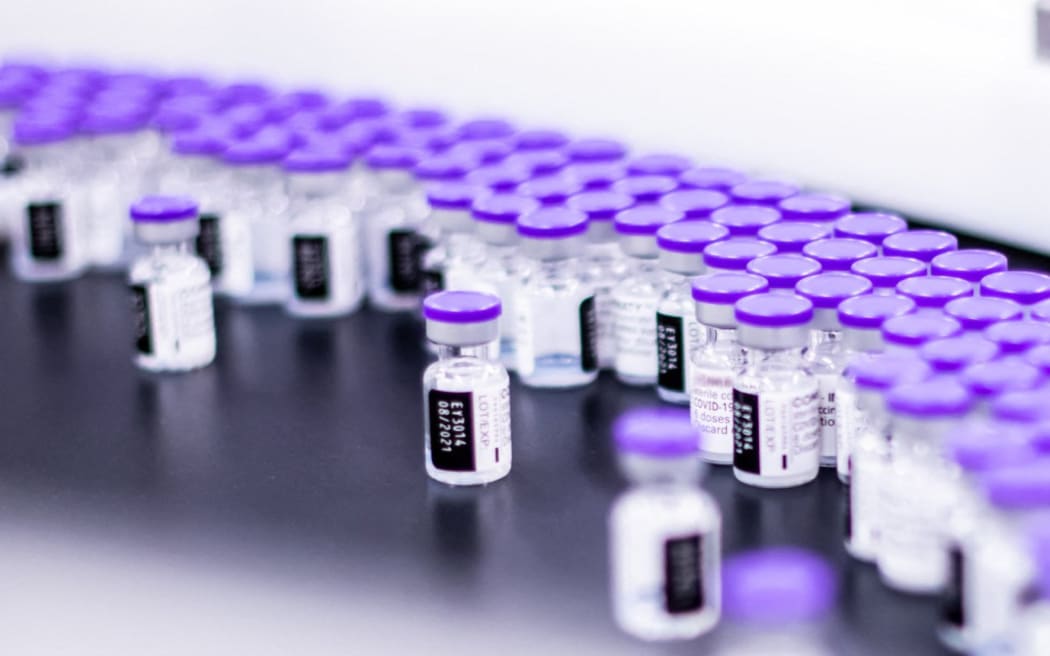 Vials of the Pfizer-BioNTech Covid-19 vaccine are prepared for packaging at the company’s facility in Puurs, Belgium.