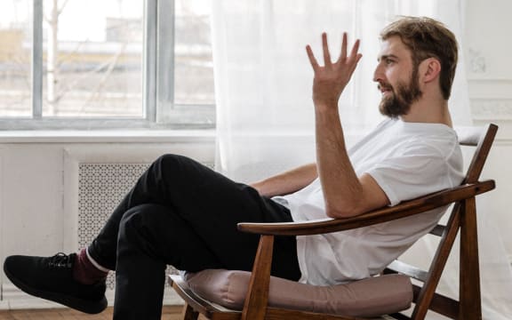 man talking in profile