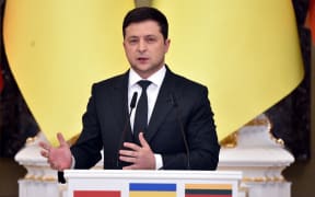 Ukrainian President Volodymyr Zelensky attends a joint press conference with his counterparts from Lithuania and Poland following their talks in Kyiv on February 23, 2022.