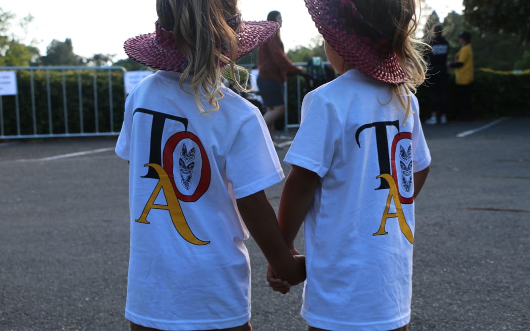 Wearing pōtae weaved from harakeke, Twins Ohae Tairongo and Toihau Raumoa rep their pāpā's rōpū, Te Taumata O Apanui at Te Matatini o Te Kāhui Maunga.