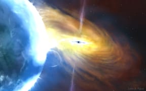 An artist's impression of the event - a giant gas cloud sucked into a supermassive black hole.