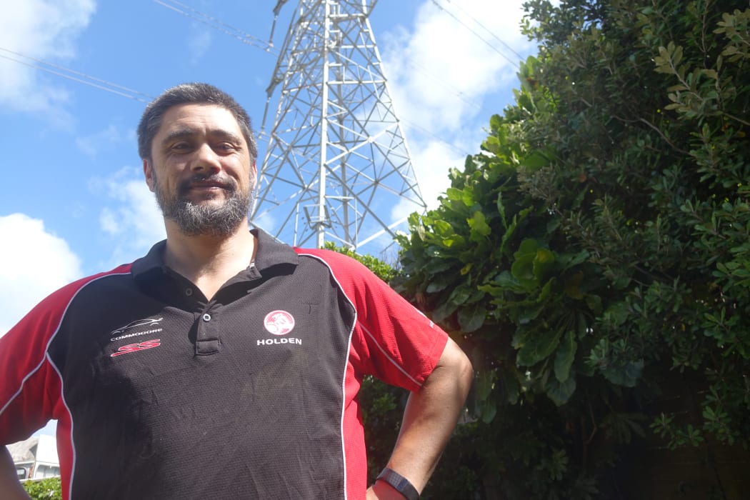 Shaun Massey-Takamore has a high-voltage power pylon looming over his back garden.