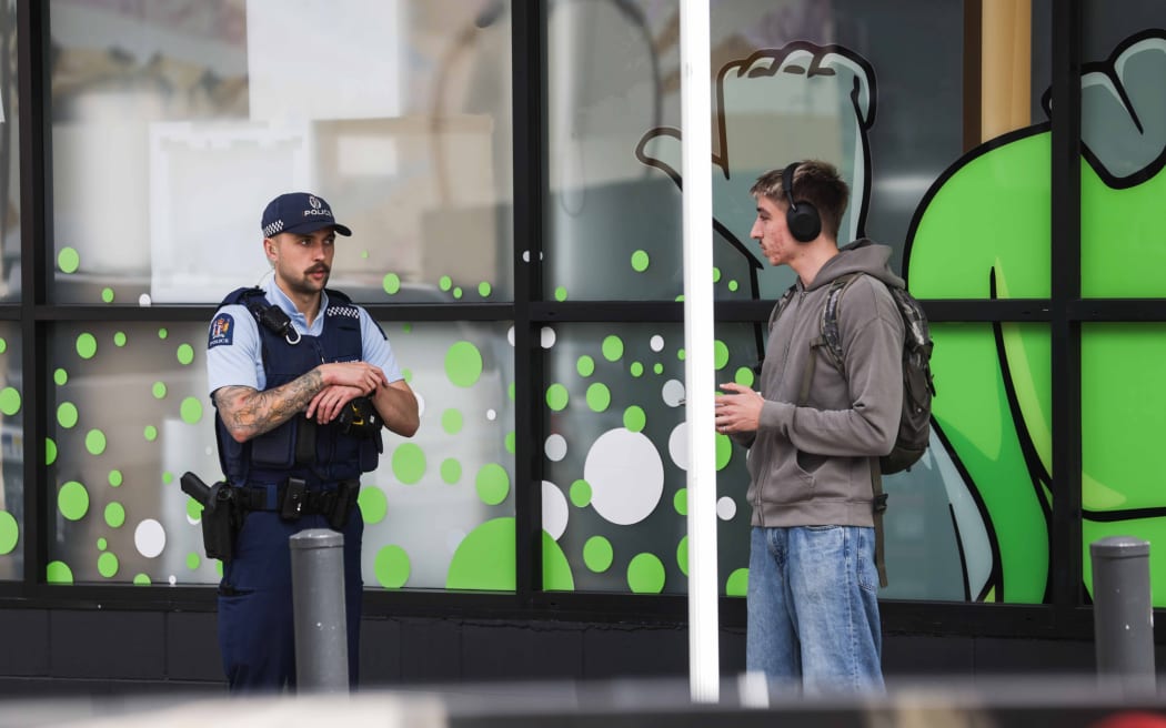Armed police have descended on Hopper Street in central Wellington.