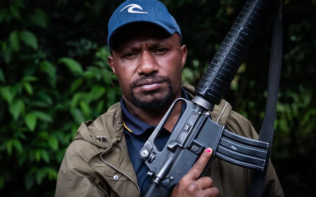 Smith Thomas used to be a tribal warlord. Now he wants his community to surrender their guns.