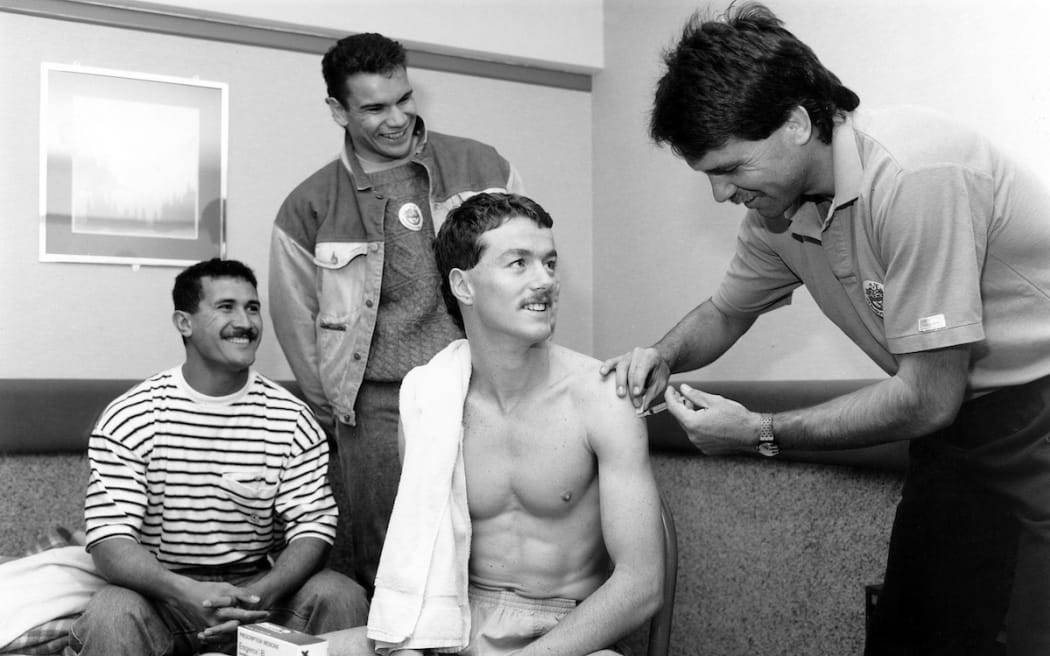 Terry Wright recieves a vaccination from Doctor John Mayhew.