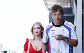 New Zealand F1 driver Liam Lawson and partner Hannah St John.