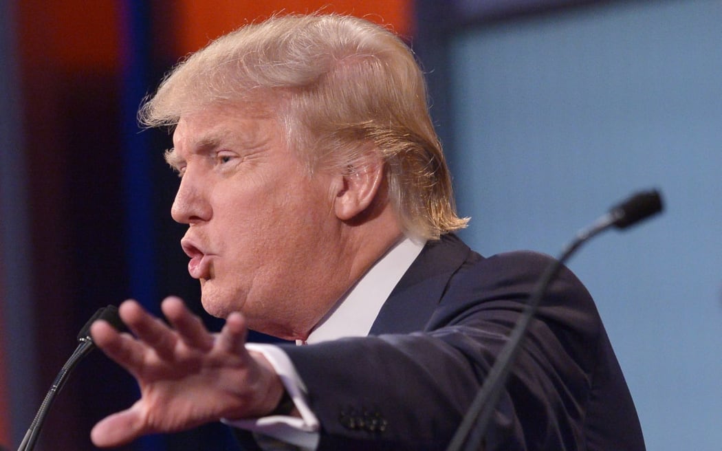 Real estate tycoon Donald Trump speaks during the Republican presidential debate on August 6, 2015 in Cleveland, Ohio.
