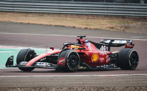 Lewis Hamilton on the track for the first time with Ferari as a Scuderia Ferrari F1 driver at the Fiorano Circuit in Maranello.