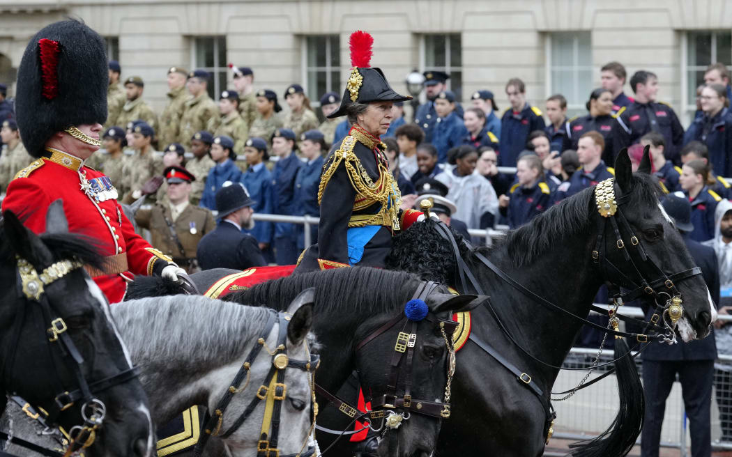 Britain's Princess Anne, Princess Royal, rides a horse during a procession following the coronation ceremony for Britain's King Charles III and Queen Camilla. - The set-piece coronation is the first in Britain in 70 years, and only the second in history to be televised. Charles will be the 40th reigning monarch to be crowned at the central London church since King William I in 1066. Outside the UK, he is also king of 14 other Commonwealth countries, including Australia, Canada and New Zealand. (Photo by Jon Super / POOL / AFP)