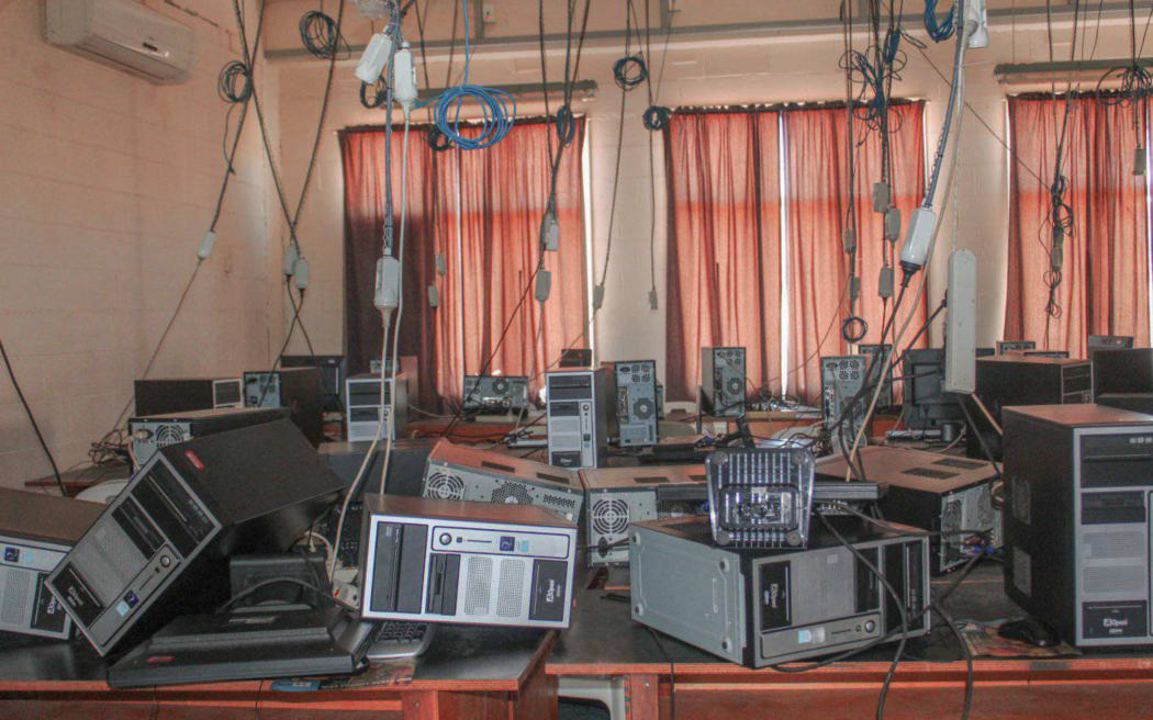 Fallen equipment in a computer room at Wawin National High School near the city of Lae.