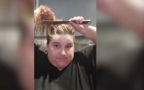 Corrie Reynolds takes haircutting into her own hands under lockdown.