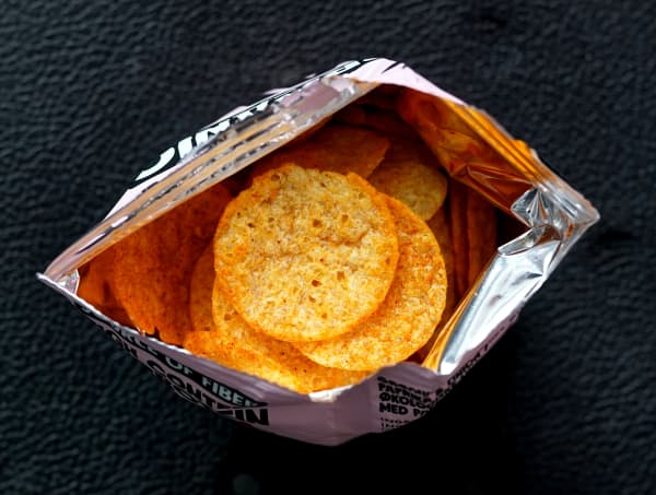 An open packet of crisps.