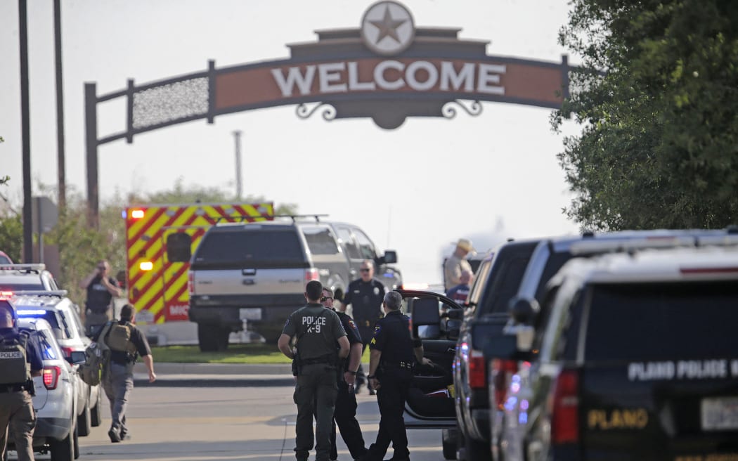 ALLEN, TEXAS - MAY 6: Emergency personnel work the scene of a shooting at Allen Premium Outlets on May 6, 2023 in Allen, Texas. According to reports, a shooter opened fire at the outlet mall, injuring nine people who were taken to local hospitals. The police have confirmed there were fatalities but have not specified how many. The unidentified shooter was neutralized by an Allen Police officer responding to an unrelated call.   Stewart F. House/Getty Images/AFP (Photo by Stewart F. House / GETTY IMAGES NORTH AMERICA / Getty Images via AFP)
