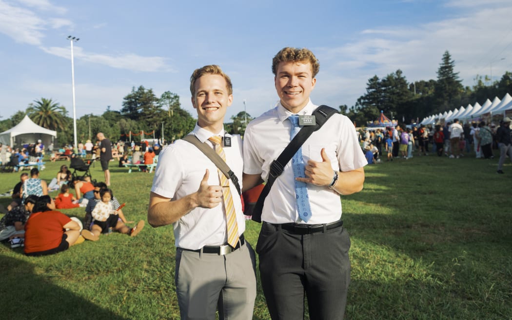 Aidan Eccles (left) attends the Auckland Lantern Festival for the second time, drawn by his interest in Chinese culture.