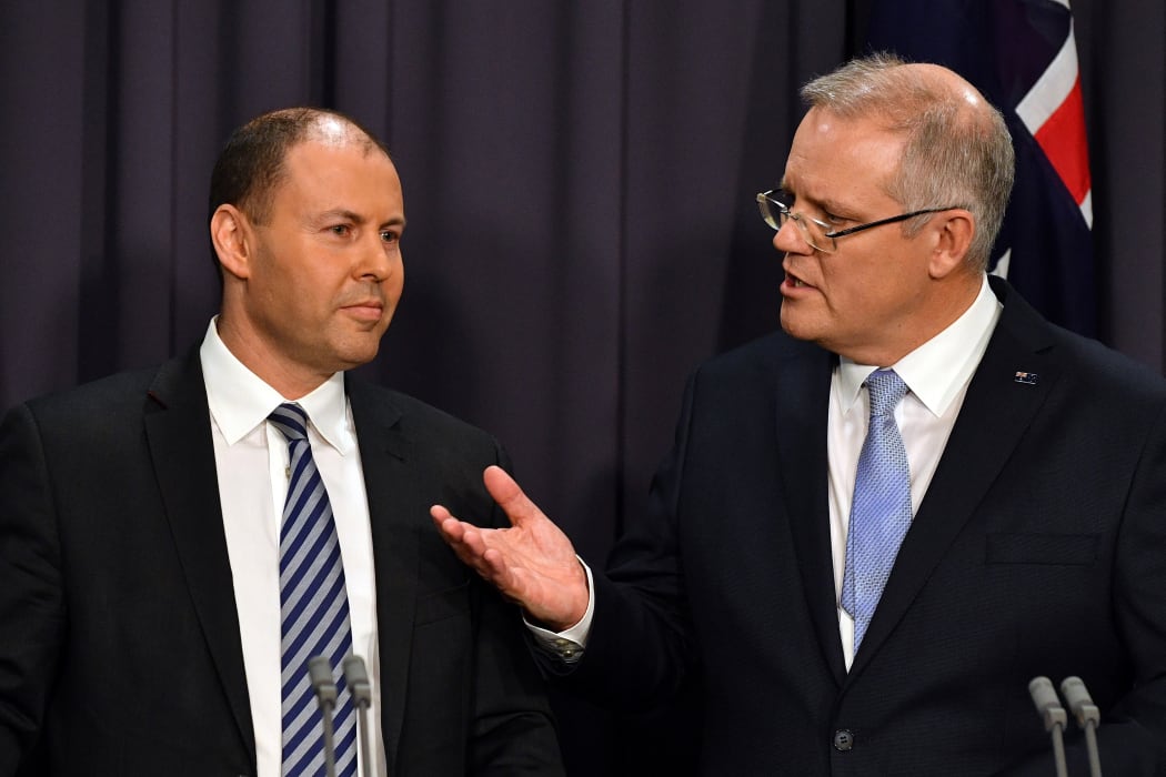 Australia's Prime Minister Scott Morrison (R) and treasurer Josh Frydenberg (L).
