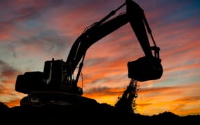 Loader excavator at work, sand mine generic.