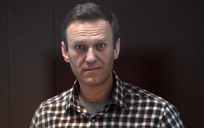 Russian opposition activist Alexei Navalny is pictured in a courtroom during a hearing on appellation to cancel the decision to replace his suspended sentence in the Yves Rocher fraud case with a real jail term at Babushkinsky Court, in Moscow, Russia.