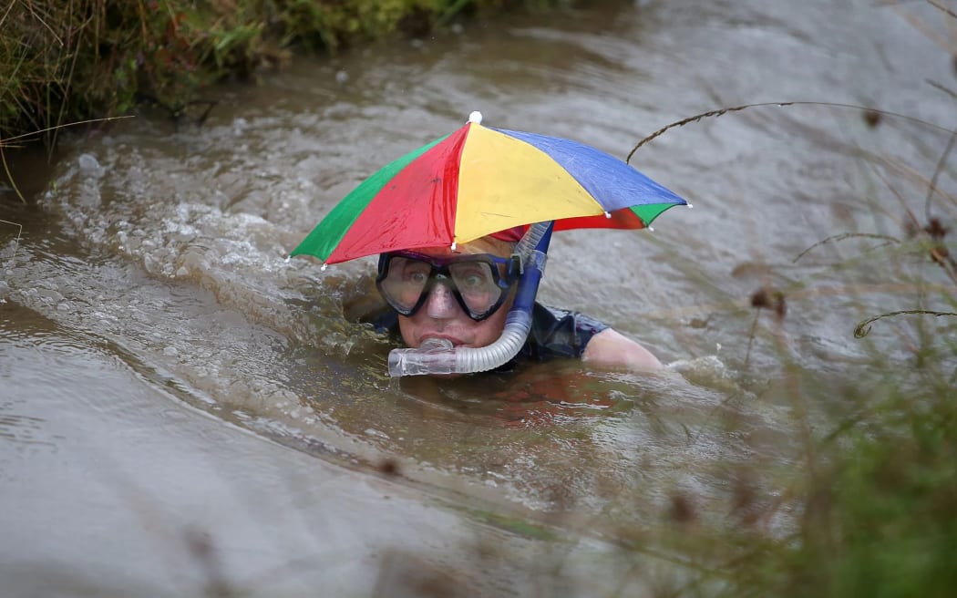 A competitor in the annual World Bog Snorkelling Championships, held in Wales